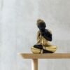 Polyresin Buddha Statue for Shelf Decor, Black and Gold, 16.5 cm x 12.7 cm