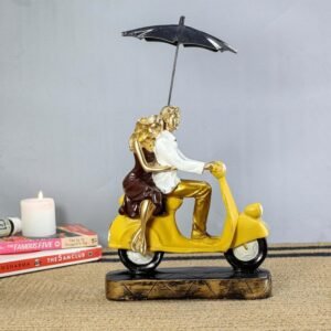 Romantic Couple Riding Yellow Scooter Statue - A Symbol of Love and Adventure