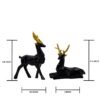 2-27.jpg Elegant Black Deer Statues with Golden Antlers - Perfect Home Decor for Modern Living Spaces