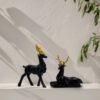 4-27.jpg Elegant Black Deer Statues with Golden Antlers - Perfect Home Decor for Modern Living Spaces