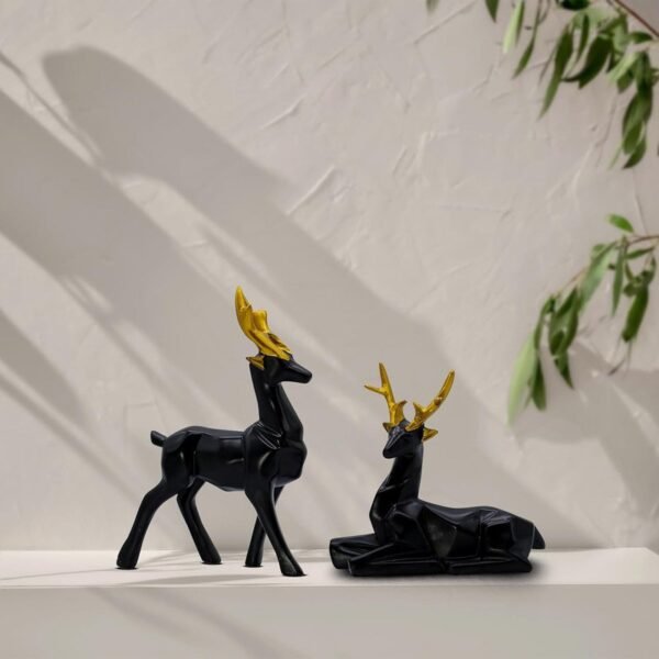 4-27.jpg Elegant Black Deer Statues with Golden Antlers - Perfect Home Decor for Modern Living Spaces