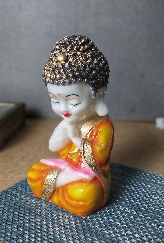 4-5-1.jpg Handicrafts Baby Buddha Showpiece Resin & Sandalwood Monk Figurine for Home & Living Room decor, Perfect Diwali Gift for Family & Friends (12X10X18cm, Orange)