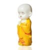 Meditating Buddha Monk Statue Decorative Baby Monk Doll Showpiece for Home Decor and Office (10 x 10 x 25 Centimeters) (Yellow)