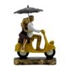 Romantic Couple Riding Yellow Scooter Statue - A Symbol of Love and Adventure